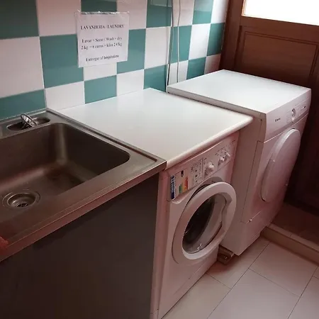 De Peregrinos De אכסניה